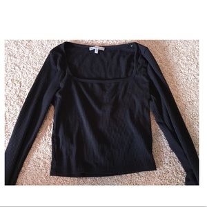 tight black crop top with long sleeves